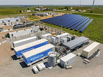 Aerial view of Flatirons campus showing solar panel arrays and energy storage facility