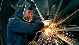 Man welding a turbine.