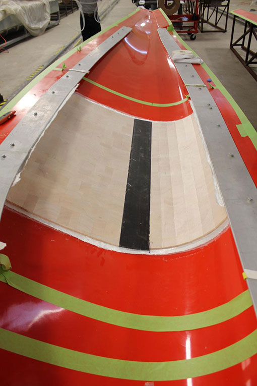 blade-section-manufacturing-1-62035 A blade is made with balsa core and spar cap during the thermoplastic blade section manufacturing process.