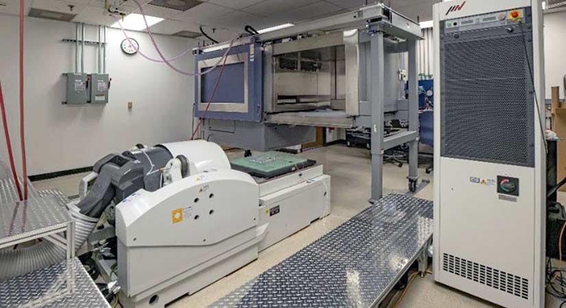 geaviation-amo-848 A room with grey machinery in every corner.