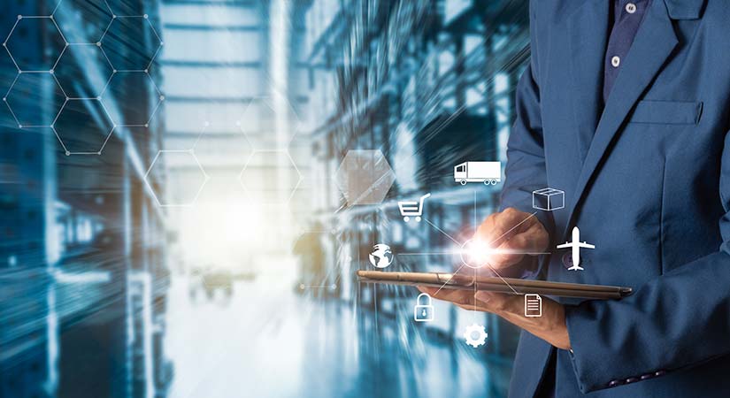 research-supply-chain-istock-1022551986-lg A close-up photo of a businessperson holding a tablet in a warehouse.