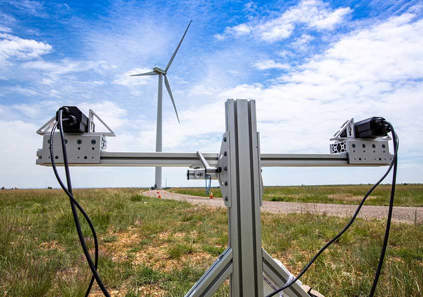 Thermal cameras set up near a wind turbine.