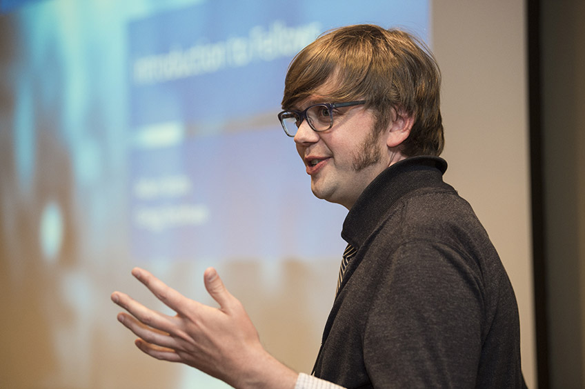 A man speaks on stage
