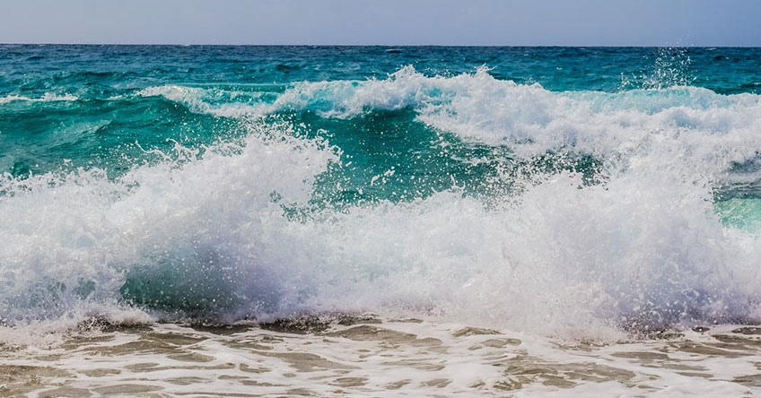 Ocean waves crashing against rocks