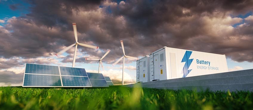Photo of solar panels, wind turbines, and battery energy storage close together, showing the interconnections between renewables and storage. The latest phase of the Storage Futures Study found that in order for grid-scale storage to meet its full market potential, there needs to be greater solar photovoltaics penetration on the grid.