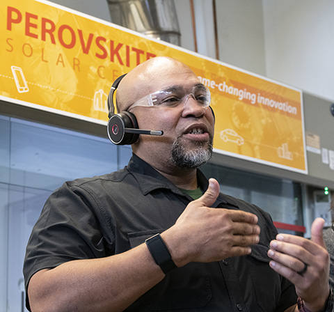 A man with headphones on speaks.