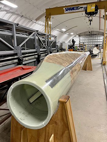 Looking down the length of a wind turbine blade