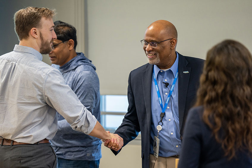 Men shaking hands.
