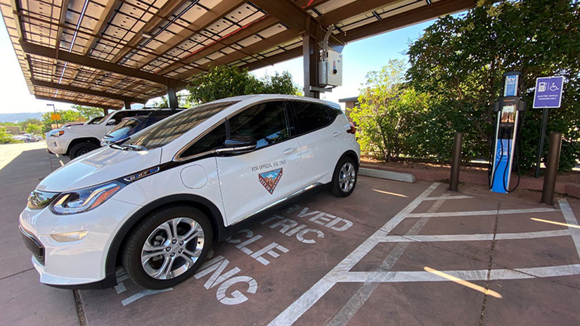 Electric vehicle parked outside at a charging station