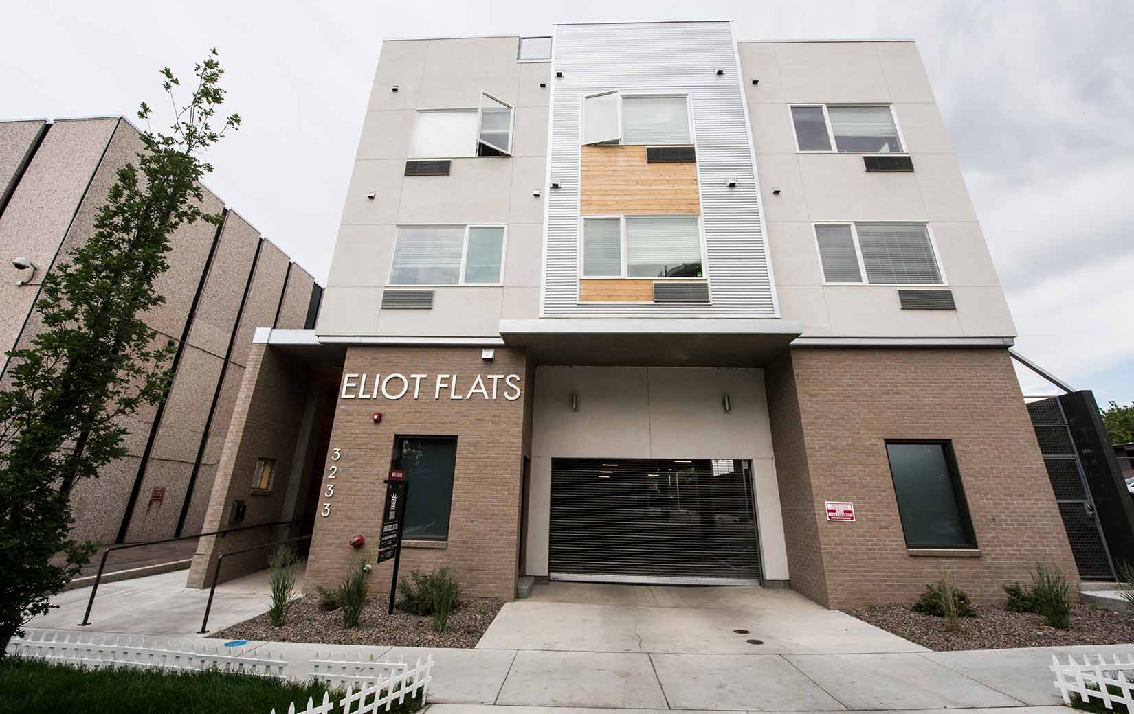 48972-body An exterior photo of the Eliot Flats apartment building