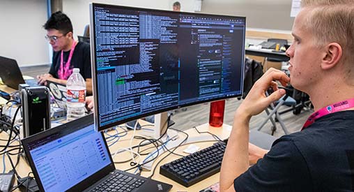 Two students working at computers