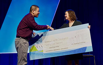 20240111-newsletter-h2osprize Photo of WPTO Director Jennifer Garson presenting the first place award in the H2Os prize.