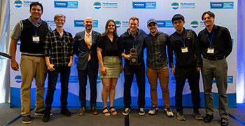 202405-hcc-competition2 Team members pose for photo while holding prize