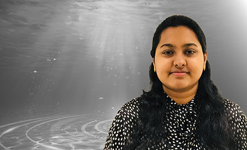 Ritu Treisa Philip overlain on a black-and-white image of underwater.