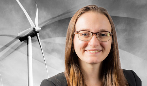 A graphic with two wind turbines and sweeping lines representing wind flow overlain by a headshot of Genevieve Starke.