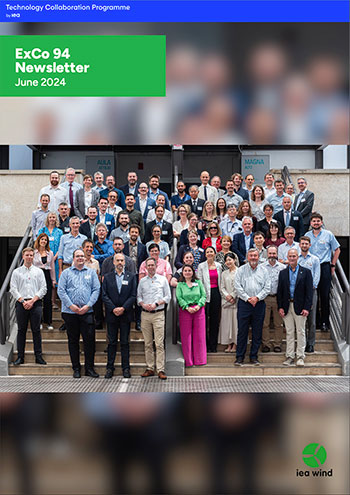 Newsletter report cover of a group of people standing on steps outside of a building in Bari, Italy