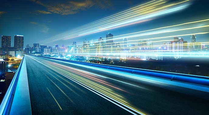 City skyline and light trails at night