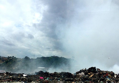 Smoking trash pile.