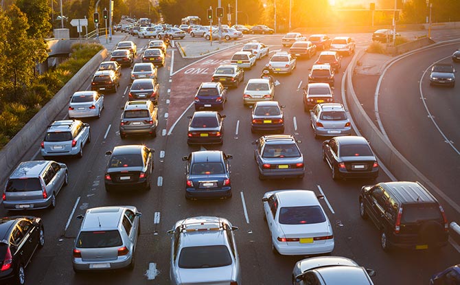 Cars on a multi-lane road.